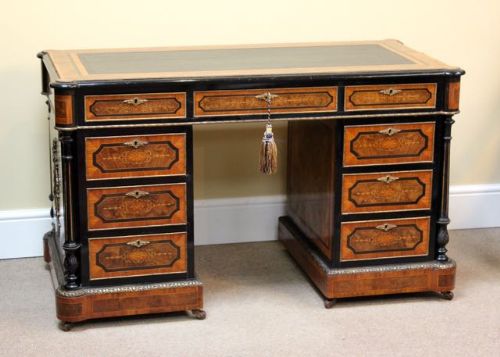 fig 1. 19thc. Pedestal Desk
veneered in kingwood with boxwood
stringing & inlay