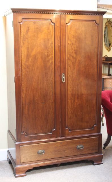 Mahogany Wardrobe with Panelled Doors and Single Drawer Beneath.