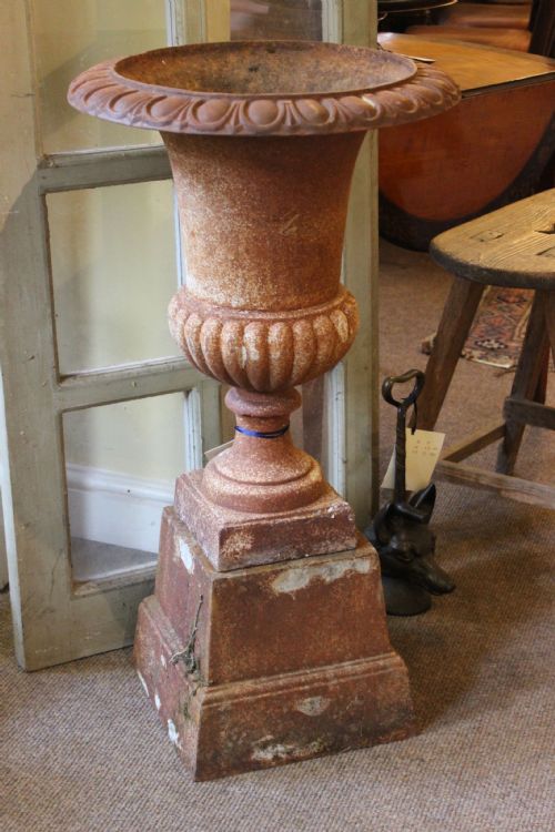 PAIR OF EDWARDIAN CAST IRON URNS ON STANDS - ADDITIONAL PHOTO 1