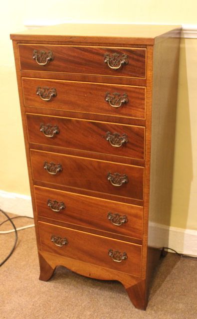 Early 20thc. Tall Thin Mahogany Wellington Chest