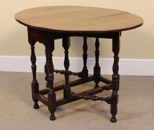 AN EARLY 18THC WALNUT GATE LEG TABLE - ADDITIONAL PHOTO 2