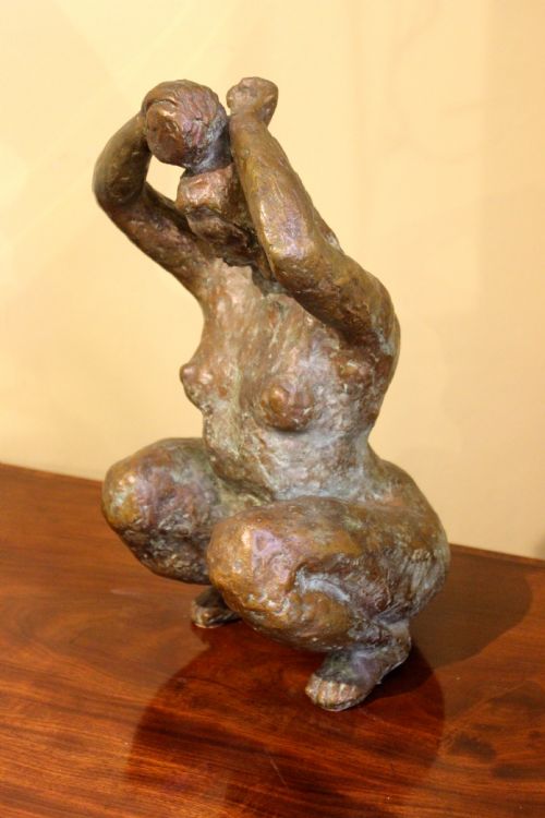 Bronze of  a Squatting Woman Bathing