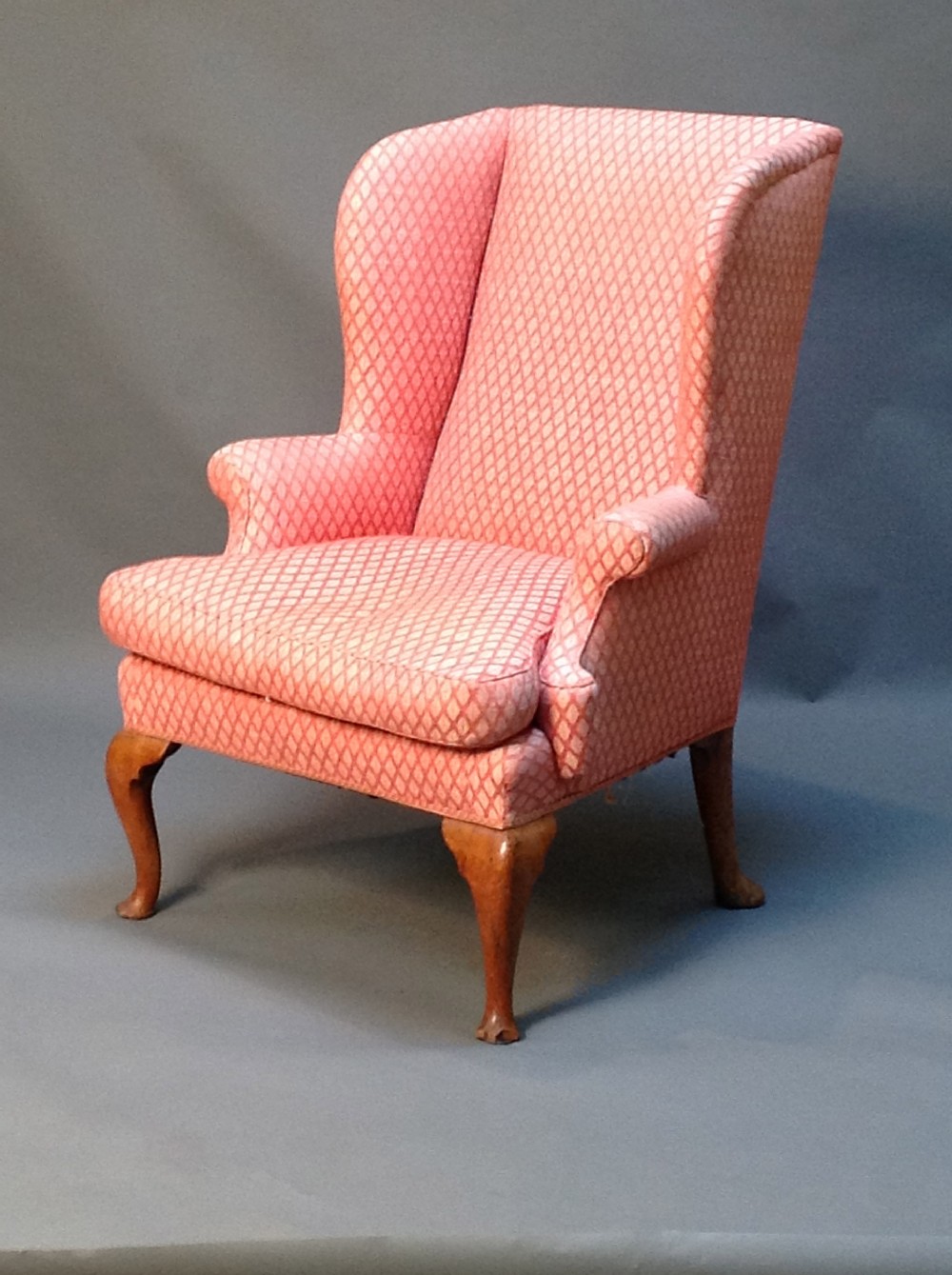 A late 18thc Cabriole Legged Walnut Wing Armchair