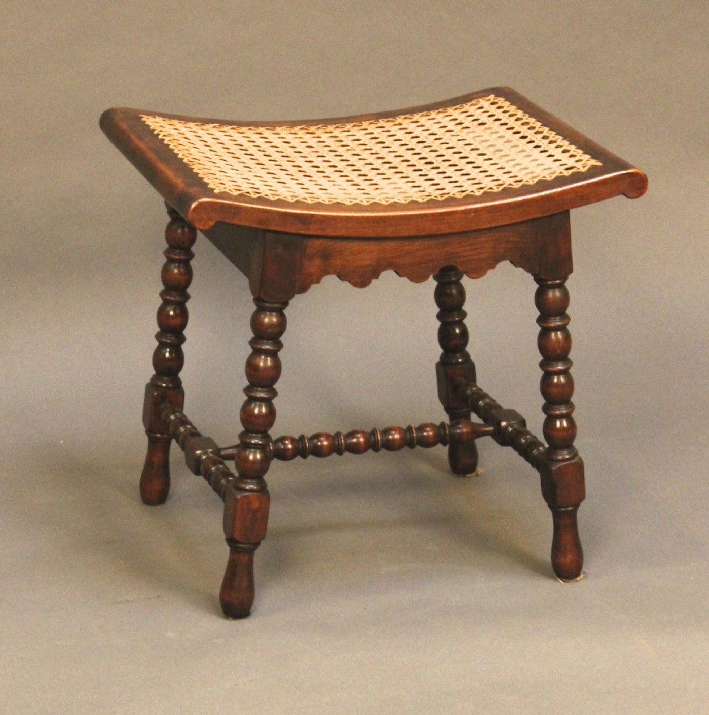 A late 19thc Walnut Stool