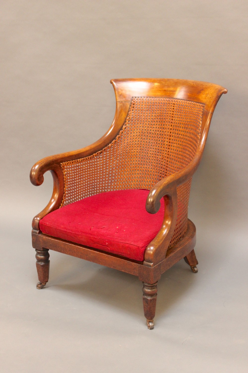 A Regency Walnut Bergere Chair