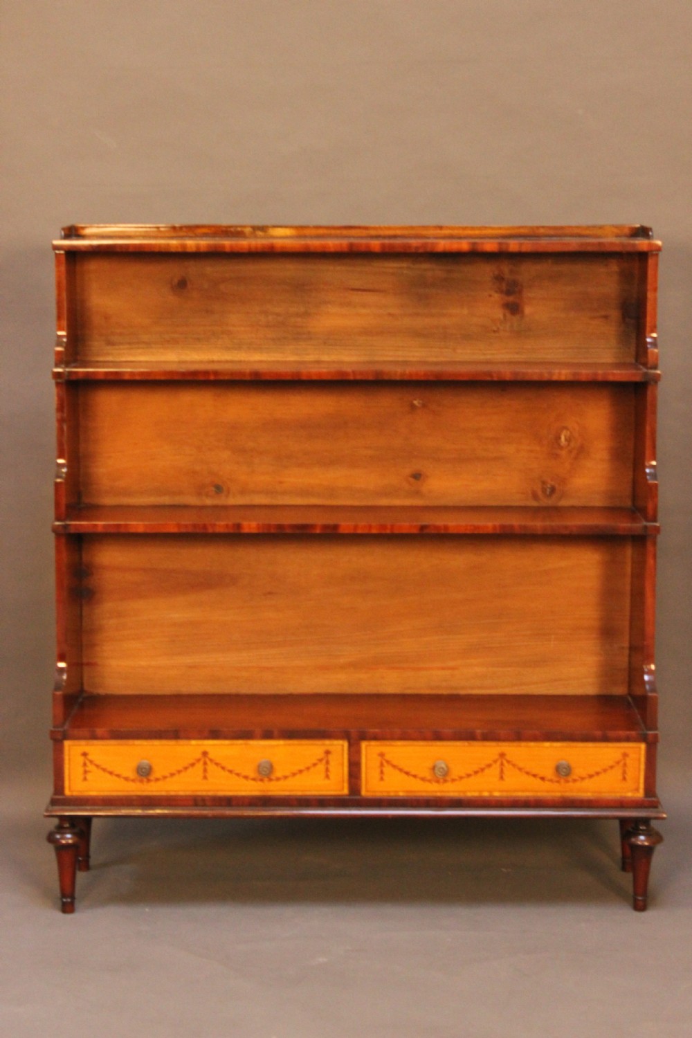Regency style waterfall bookcase