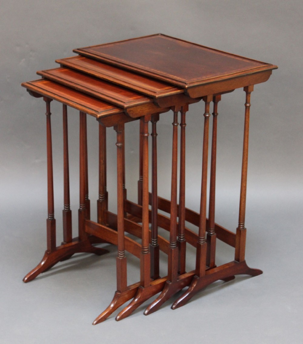 A Fine Edwardian Nest of Four Mahogany Tables