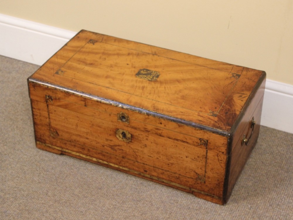 A small 19th-century rectangular camphor wood chest featuring brass inlay line work, side carrying handles, and a central brass keyhole escutcheon. View III