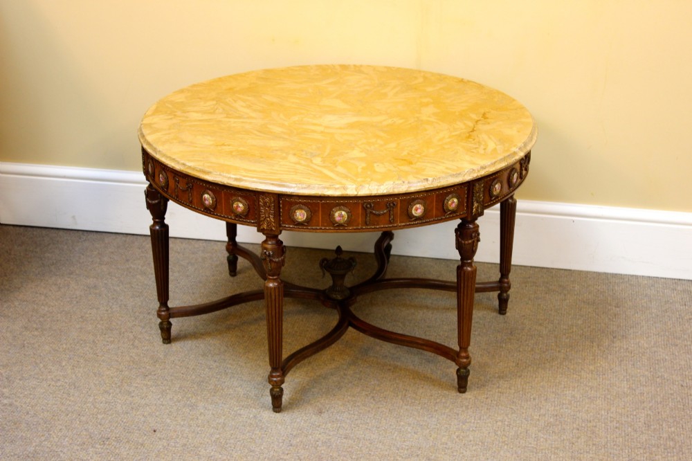 An Edwardian Marble Topped Coffee Table