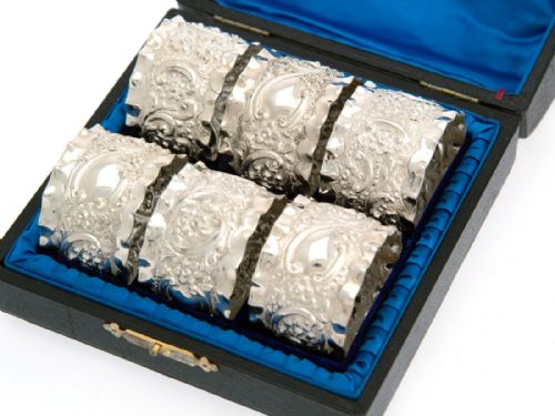 SET OF SIX BOXED VICTORIAN SILVER PLATED NAPKIN RINGS - ADDITIONAL PHOTO 1