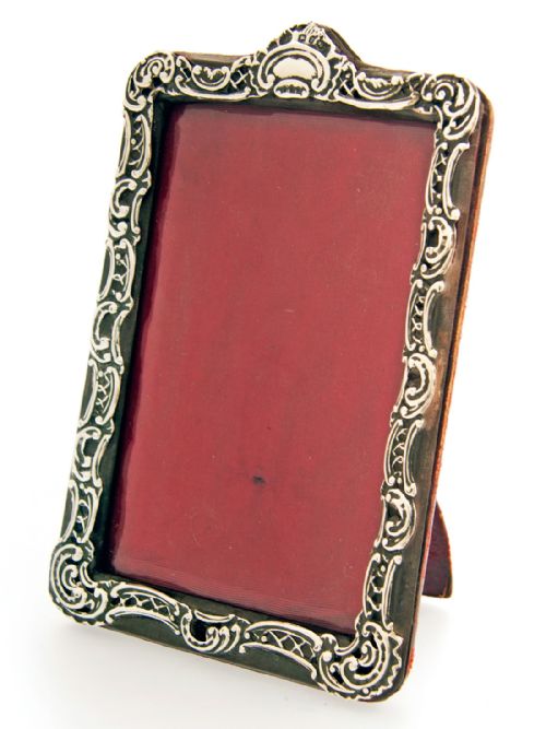 victorian pierced and embossed silver picture frame with beveled glass and leather back - CATEGORY: ANTIQUE MISCELLANEOUS - DATED 1900