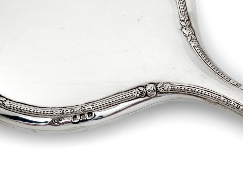 ANTIQUE SILVER CIRCULAR HAND MIRROR WITH A DELICATE FLORAL BORDER - ADDITIONAL PHOTO 2