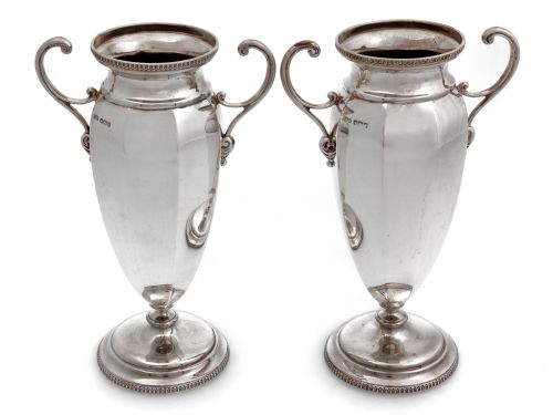 pair of vintage eight panelled silver vases with scroll handles - CATEGORY: ANTIQUE SILVER - DATED 1930