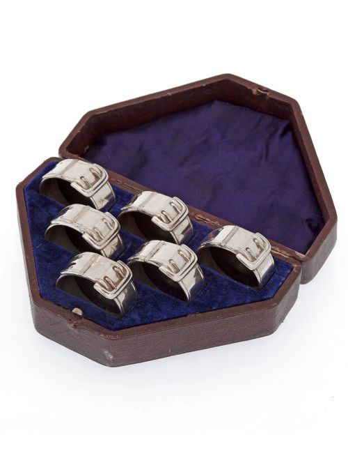 six silver plated numbered napkin rings cast in the shape of buckles - CATEGORY: ANTIQUE SILVER - DATED 1890