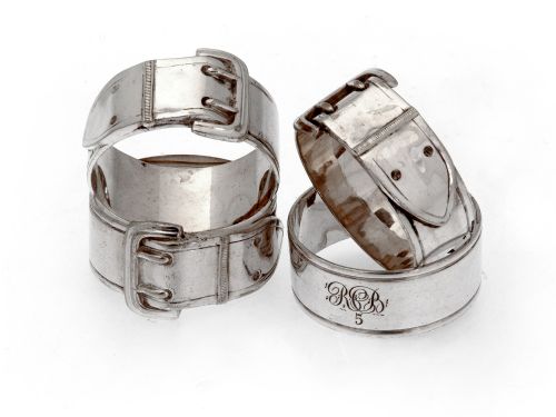 SIX SILVER PLATED NUMBERED NAPKIN RINGS CAST IN THE SHAPE OF BUCKLES - ADDITIONAL PHOTO 1