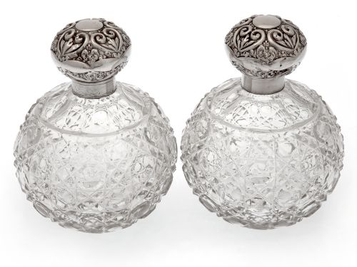 pair of large globe shaped silver top perfume bottles with hob cut glass bodies - CATEGORY: ANTIQUE SILVER - DATED 1900