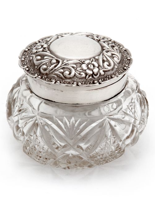 edwardian dressing table jar with a hinged silver floral repousse lid and cut glass body - CATEGORY: ANTIQUE SILVER - DATED 1900
