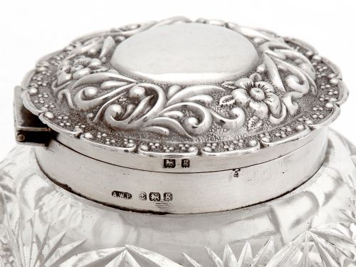 EDWARDIAN DRESSING TABLE JAR WITH A HINGED SILVER FLORAL REPOUSSE LID AND CUT GLASS BODY - ADDITIONAL PHOTO 3