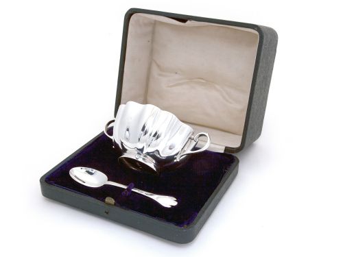 boxed silver bowl with two handles and a matching trefid style spoon - CATEGORY: ANTIQUE SILVER - DATED 1910