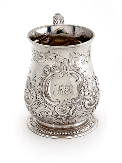 GEORGE II SILVER CHRISTENING MUG WITH A CHASED FLORAL AND SCROLL BALUSTER FORM BODY - ADDITIONAL PHOTO 1