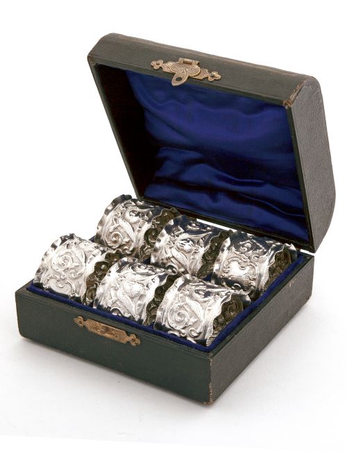 set of six edwardian silver napkin rings fitted in a blue silk and velvet lined box - CATEGORY: ANTIQUE SILVER - DATED 1900