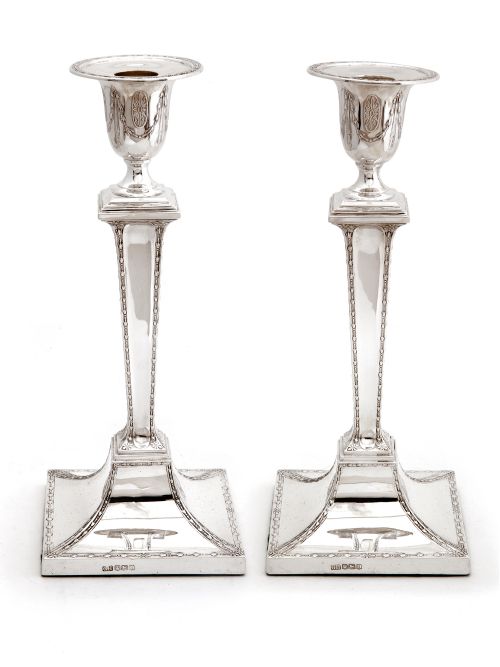 pair of silver candle sticks decorated with fine garlands to the stems - CATEGORY: ANTIQUE SILVER - DATED 1920