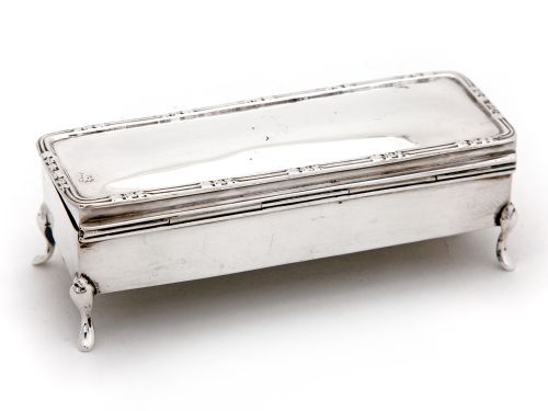 EDWARDIAN SILVER JEWELLERY BOX WITH A PLAIN BODY A PLAIN HINGED LID AND REED AND LEAF BORDER - ADDITIONAL PHOTO 1