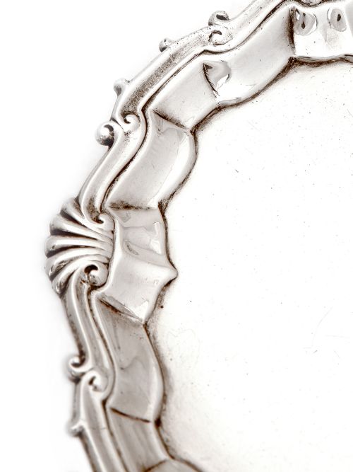 GEORGE II SILVER SALVER WITH AN APPLIED SHELL AND SCROLL BORDER - ADDITIONAL PHOTO 1