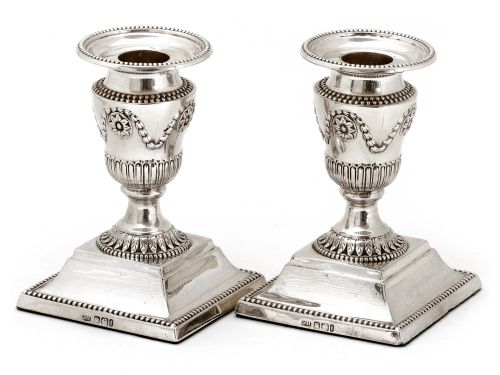 pair of edwardian silver dwarf candlesticks with garland and fluted capitals leading to circular acanthus style collar - CATEGORY: ANTIQUE SILVER - DATED 1900