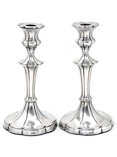 attractive pair of silver candlesticks with plain fluted columns leading down to fluted circular shaped plain bases - CATEGORY: ANTIQUE SILVER - DATED 1930