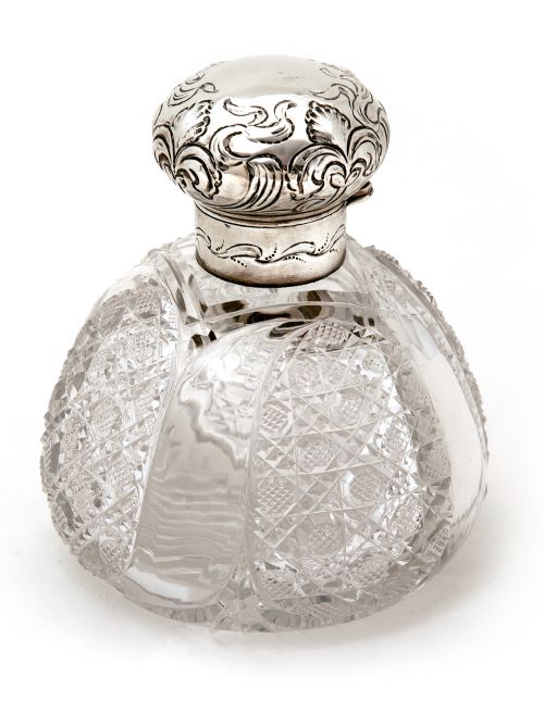 large late victorian silver topped perfume bottle with a hinged repousse floral scroll decorated lid - CATEGORY: ANTIQUE SILVER - DATED 1900