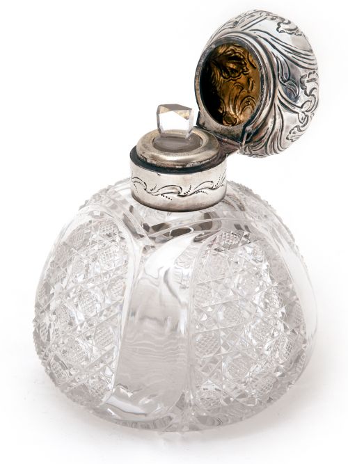 LARGE LATE VICTORIAN SILVER TOPPED PERFUME BOTTLE WITH A HINGED REPOUSSE FLORAL SCROLL DECORATED LID - ADDITIONAL PHOTO 1