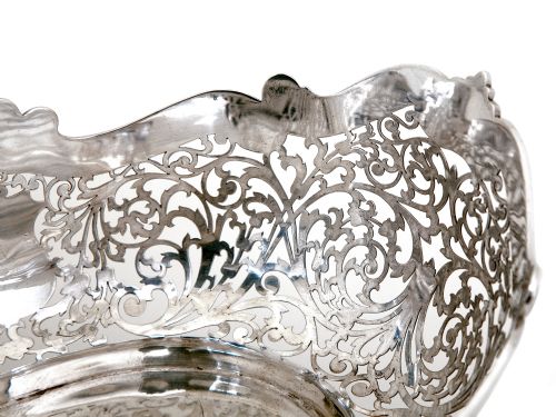 OVAL SILVER BOWL WITH A SHAPED FLORAL SCALLOPED BORDER AND PIERCED BODY - ADDITIONAL PHOTO 1