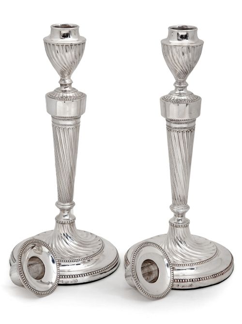 PAIR OF VICTORIAN SILVER CANDLESTICKS WITH A FLUTED SPIRAL FORM STEM AND BASE - ADDITIONAL PHOTO 1