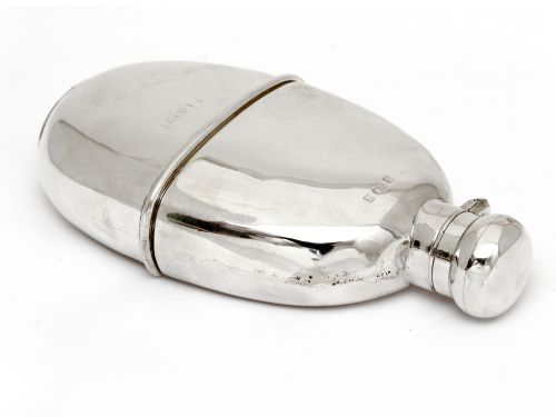 oval plain silver flask with a detachable cup - CATEGORY: ANTIQUE SILVER - DATED 1900