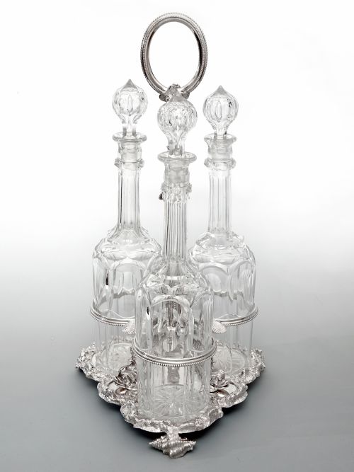 victorian silver plated cast decanter stand with three cut glass decanters - CATEGORY: ANTIQUE GLASS - DATED 1880