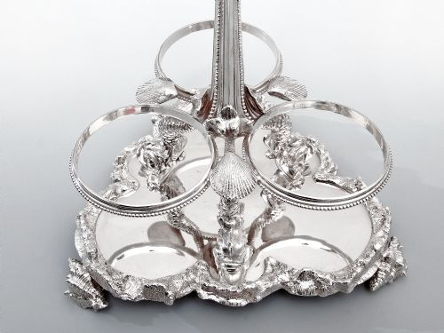 VICTORIAN SILVER PLATED CAST DECANTER STAND WITH THREE CUT GLASS DECANTERS - ADDITIONAL PHOTO 4