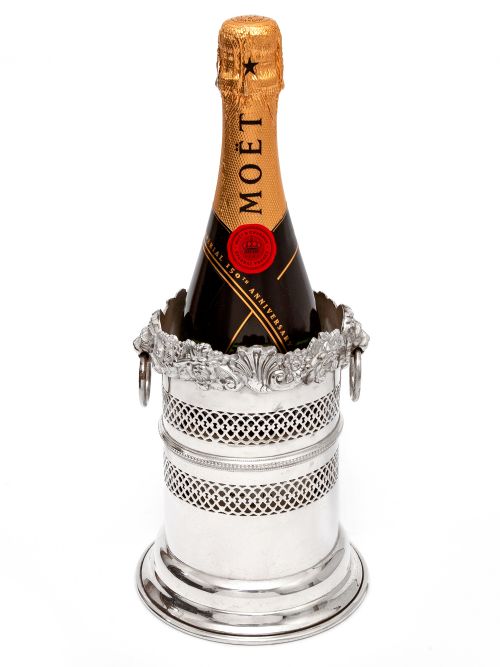 SILVER PLATED BOTTLE STAND WITH A SHELL AND FLORAL TOP BORDER AND LION RING HANDLES - ADDITIONAL PHOTO 1