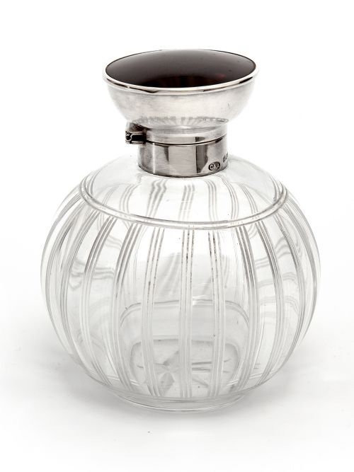 silver topped perfume bottle with a tortoiseshell lid and clear cut glass body - CATEGORY: ANTIQUE SILVER - DATED 1920