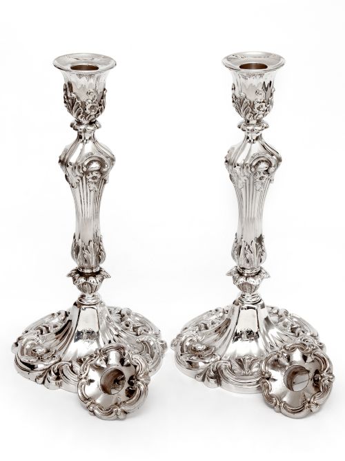 PAIR OF DECORATIVE VICTORIAN SILVER PLATED CANDLE STICKS IN A HIGH ROCOCO FORM - ADDITIONAL PHOTO 1