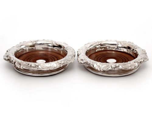 pair of victorian silver plated coasters with embossed vine leaf borders - CATEGORY: ANTIQUE SILVER - DATED 1880