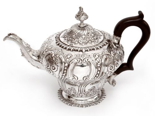 LATE VICTORIAN THREE PIECE SILVER TEA SET CHASED WITH FLOWERS AND SCROLLS - ADDITIONAL PHOTO 1