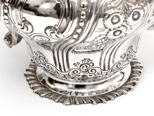 LATE VICTORIAN THREE PIECE SILVER TEA SET CHASED WITH FLOWERS AND SCROLLS - ADDITIONAL PHOTO 7