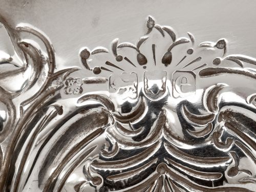 LATE VICTORIAN THREE PIECE SILVER TEA SET CHASED WITH FLOWERS AND SCROLLS - ADDITIONAL PHOTO 8