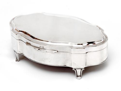 antique silver trinket box in an oval shaped form with a plain hinged lid - CATEGORY: ANTIQUE SILVER - DATED 1910
