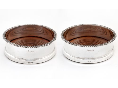 pair of antique silver coasters in a georgian style - CATEGORY: ANTIQUE SILVER - DATED 1910