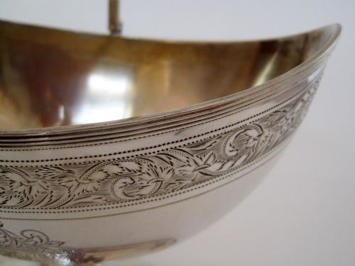 GEORGE III OVAL SILVER SUGAR BASKET WITH A REEDED SWING HANDLE - ADDITIONAL PHOTO 3