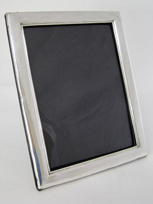 large edwardian silver photo frame with a plain curved mount - CATEGORY: ANTIQUE SILVER - DATED 1900