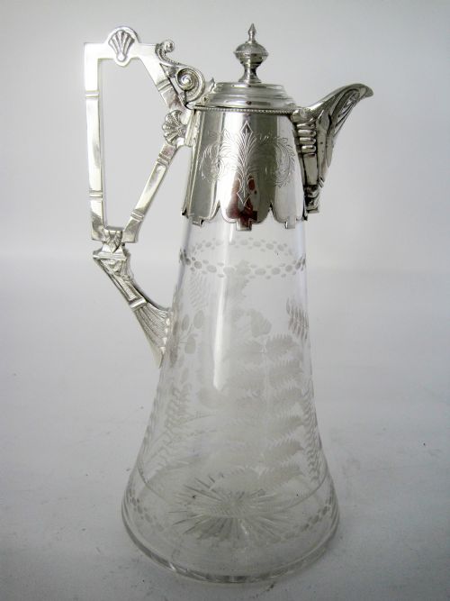 victorian silver plated claret jug with cast fluted spout and an unusual stylised handle - CATEGORY: ANTIQUE SILVER - DATED 1890