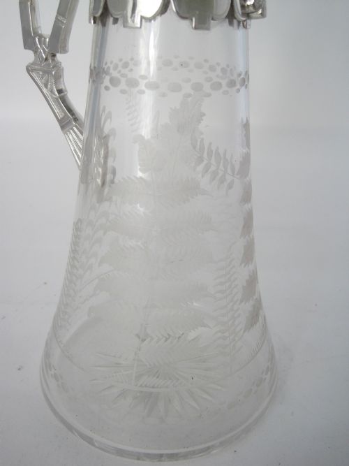 VICTORIAN SILVER PLATED CLARET JUG WITH CAST FLUTED SPOUT AND AN UNUSUAL STYLISED HANDLE - ADDITIONAL PHOTO 4